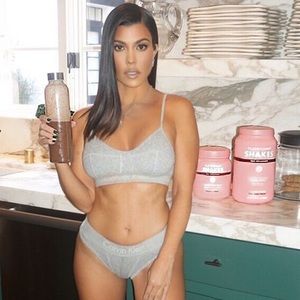 CALVIN KLEIN GREY SPORTS BRA SIZE SMALL